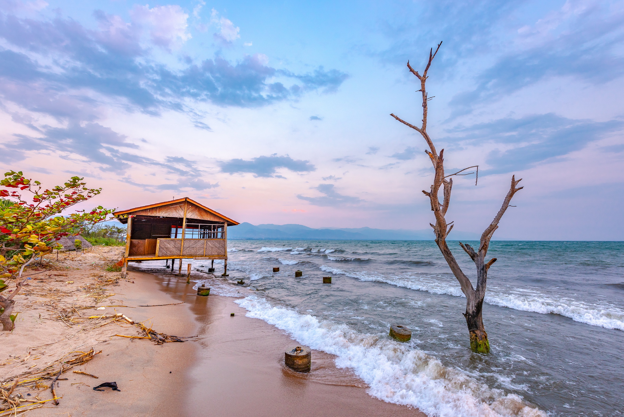 Burundi,Bujumbura,Lake,Tanganyika,,Windy,Cloudy,Sky,And,Sand,Beach